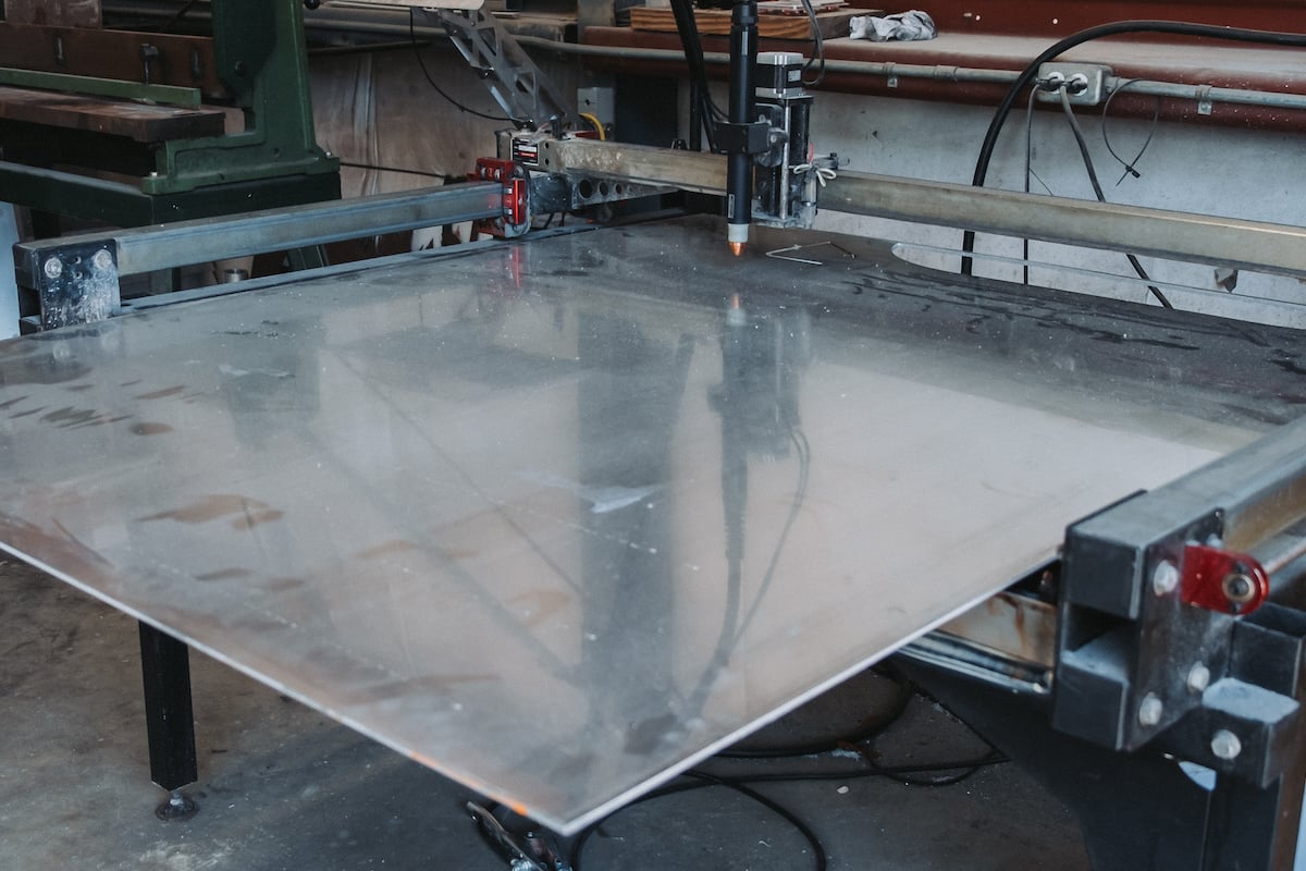 Aluminum sheet on cutting table