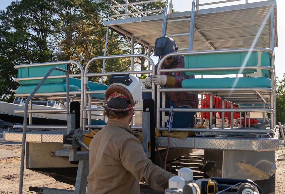 ECWF Team working on double decker boat
