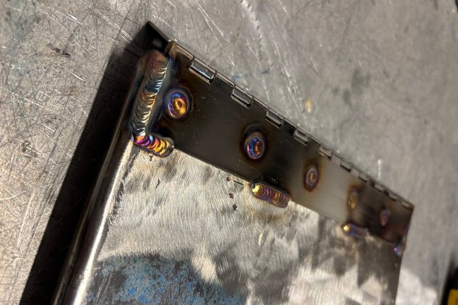 welded metal plate with hinges